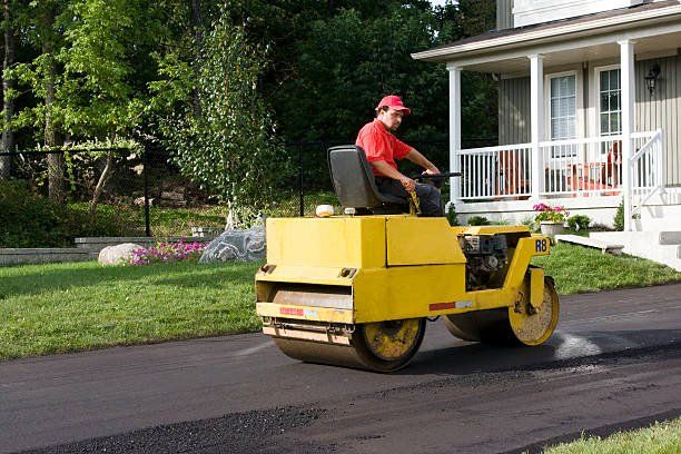 construction crew preparing concrete and driveway materials in Miami